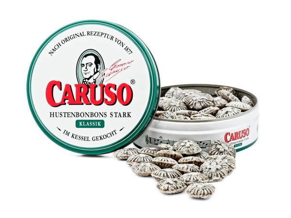 Geöffnete CARUSO Klassik Dose mit sichtbaren Hustenbonbons
