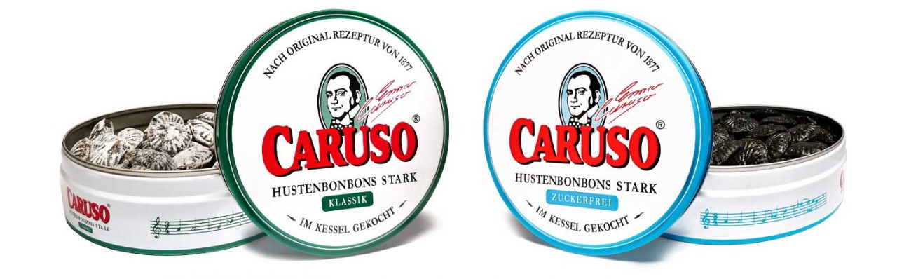 Geöffnete CARUSO Klassik und CARUSO Zuckerfrei Dosen mit sichtbaren Bonbons
