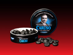 Geöffnete CARUSO Kulturbonbon Zuckerfrei Dose mit dunklen Bonbons und Soft-Inlay
